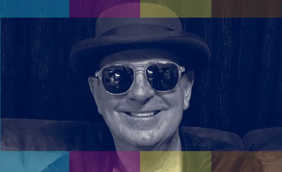 Ian Wilks harp player picture in a duo tone - dark blue and black